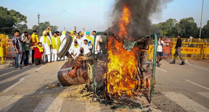 Farm bills: Protesters set tractor on fire near India Gate, five arrested